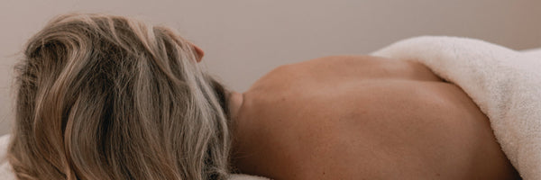 Restorative massage therapy in a tranquil spa environment for winter wellness