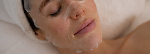 Client enjoying a professional barrier repair facial with hydrating mask at Botanica Wellness Spa Melbourne.