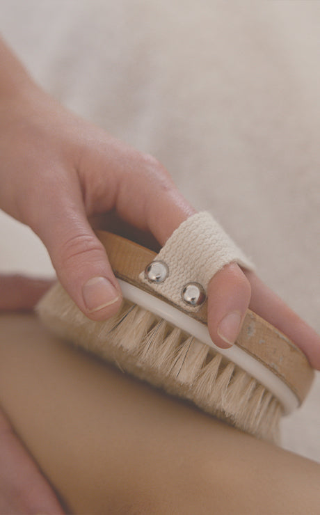 Dry body brushing targeting exfoliation and circulation boost apart of Spring Renewal Ritual